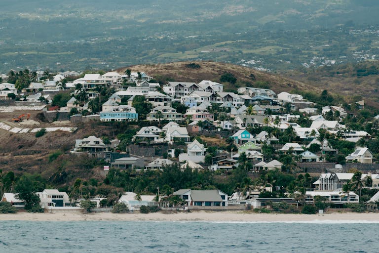 A view of a small town on the side of a hill